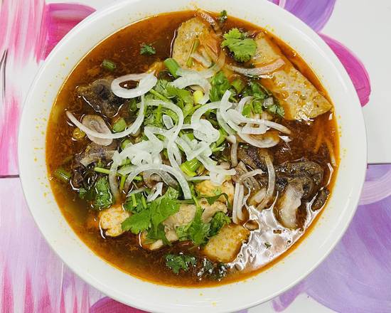 Order P16. Spicy Hue Style Noodle Soup/ Bún Bò Huế  food online from Pho Binh Minh store, Maple Valley on bringmethat.com