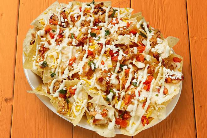Order Fajita Chicken Nachos food online from Fuzzy's Taco Shop store, Lakeland on bringmethat.com