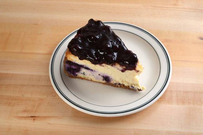 Order Blueberry-Topped New York Cheesecake food online from Brent Deli store, Westlake Village on bringmethat.com