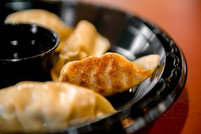 Order Pork Dumpling (6) food online from Mulan Asian Bistro - Houston Levee store, Germantown on bringmethat.com