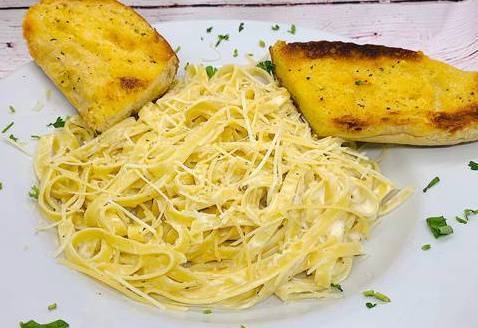 Order Fettuccine Alfredo food online from Selma Chicago Pizzeria store, Rancho Santa Margarita on bringmethat.com