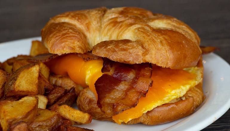 Order Bacon, Egg & Cheese Croissant* food online from Metro Diner store, Oviedo on bringmethat.com