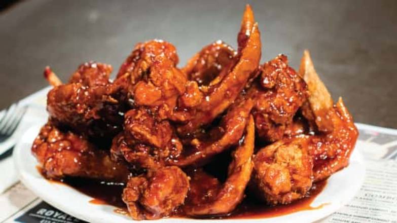 Order Henny Wings (10) food online from Dallas BBQ store, Jamaica on bringmethat.com