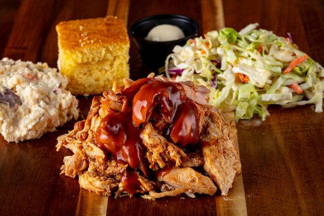 Order Pulled Smoked Chicken food online from Bad to The Bone BBQ store, San Juan Capistrano on bringmethat.com