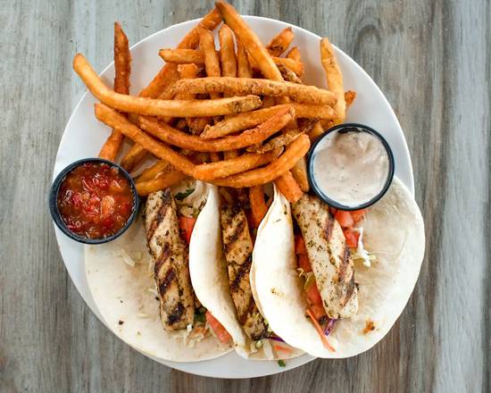 Order (2) Tacos food online from Whiteys Fish Camp store, Fleming Island on bringmethat.com
