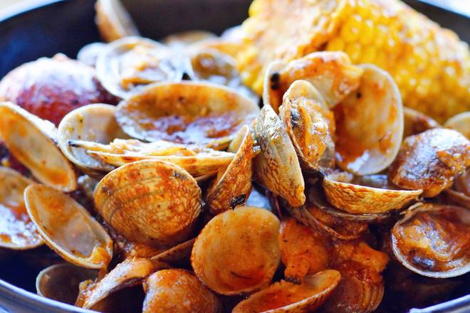 Order M7. Clams (1LB) food online from Captain King's Seafood City store, Memphis on bringmethat.com