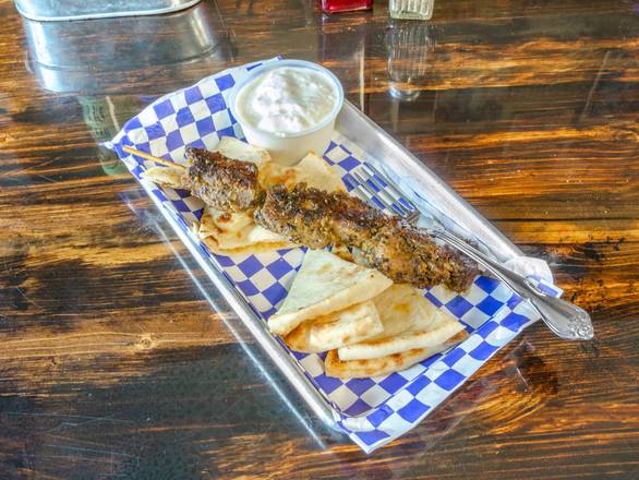 Order Pork Souvlaki food online from Think Greek- Port St Lucie store, Port St. Lucie on bringmethat.com