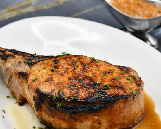 Order 16 oz. Double-Cut Prime Pork Chop food online from Morton The Steakhouse store, Orlando on bringmethat.com