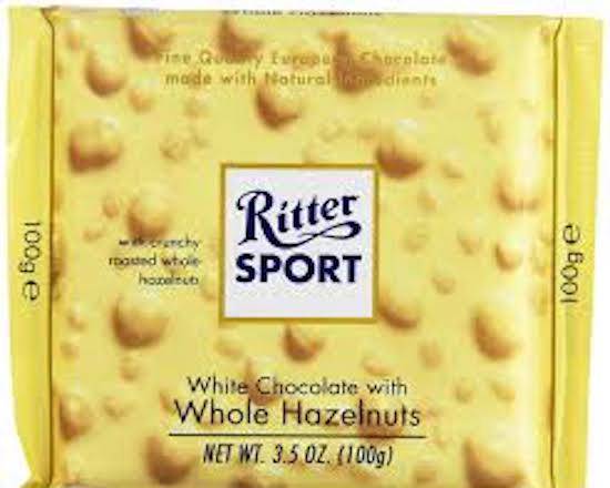 Order Ritter Sport White Chocolate Whole Hazelnuts 3.5oz food online from George's Market store, San Francisco on bringmethat.com