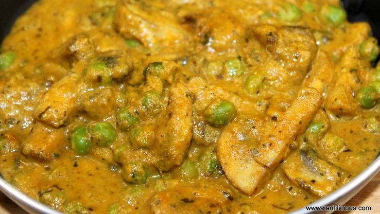 Order Mushroom Mutter food online from Maa Kitchen store, Jacksonville on bringmethat.com