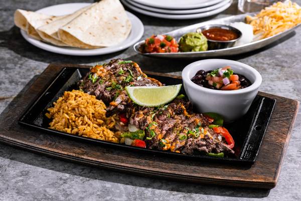 Order Steak Fajitas food online from Chili's store, Austin on bringmethat.com