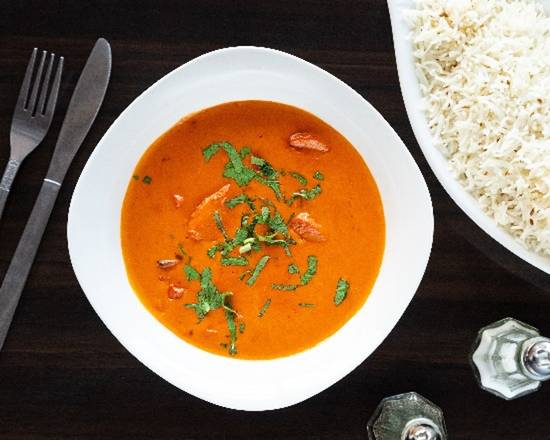 Order Butter Chicken (Served with Rice) food online from Tandoor Indian Restaurant And Pizza store, Sunrise on bringmethat.com