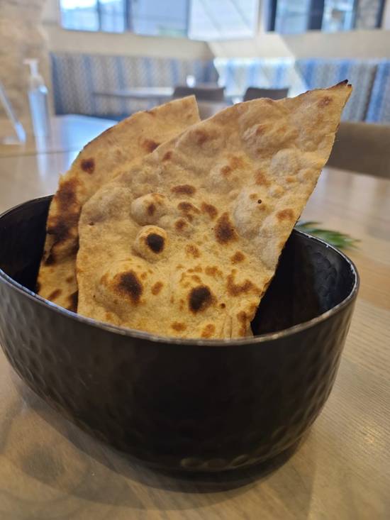 Order Tandoori Plain Roti (VG) food online from Raag Indian Cuisine store, Minneapolis on bringmethat.com