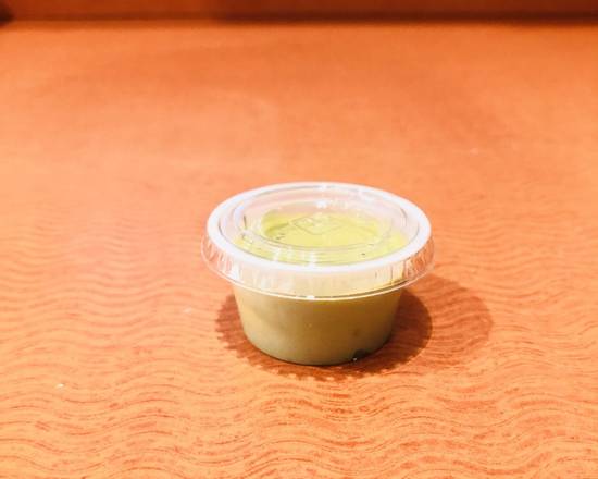 Order Extra Green Salsa food online from Donut Tacos Palace store, Austin on bringmethat.com