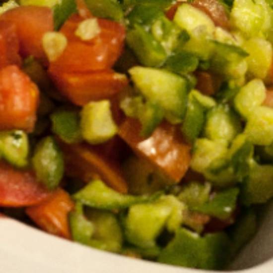 Order Israeli Salad food online from Nagila Pizza store, Los Angeles on bringmethat.com