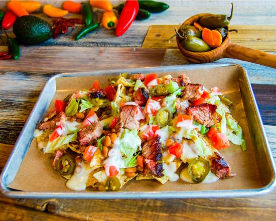 Order Nachos food online from Bar-b-Cutie store, Nashville on bringmethat.com