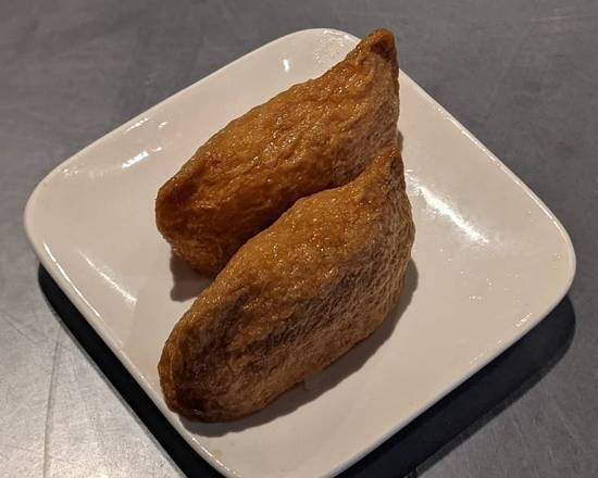 Order Inari (Rice Filled Tofu Skin) Nigiri food online from Jojo Sushi Bar & Restaurant store, Santa Rosa on bringmethat.com