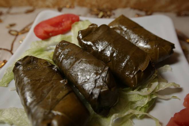 Order Grape Leaves (4 pcs) food online from Cafe Layal store, HOUSTON on bringmethat.com