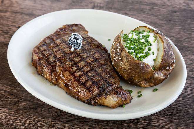 Order Rib Eye food online from Wood Ranch BBQ & Grill store, Rancho Santa Margarita on bringmethat.com