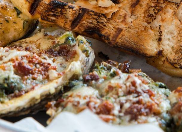 Order Spinach Madeleine Chargrilled food online from The Rouxpour store, Friendswood on bringmethat.com