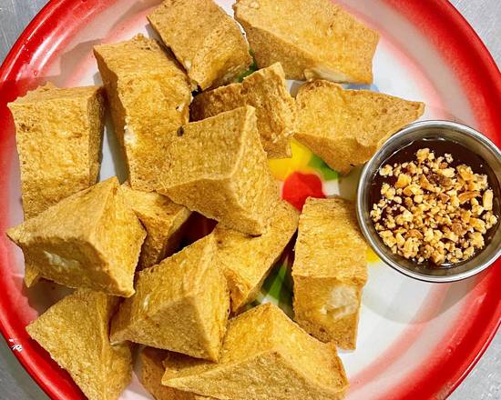 Order Triangle Tofu food online from Baramee Thai Restaurant store, San Pedro on bringmethat.com