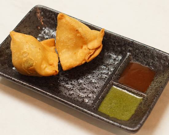 Order Veg Samosa (2 pcs) food online from Inchin Bamboo Garden store, San Ramon on bringmethat.com