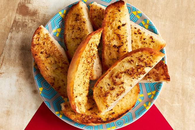 Order Garlic Sticks food online from Nando's Peri-Peri store, College Park on bringmethat.com