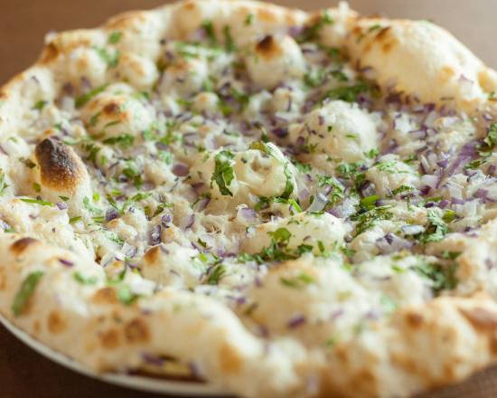 Order Onion Kulcha food online from Taste of India store, Seattle on bringmethat.com