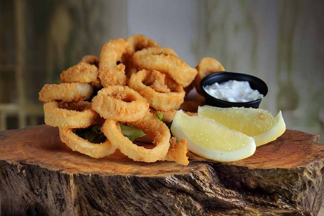 Order Calamari Rings (1/2 lb) food online from Mb Grill store, Pinellas Park on bringmethat.com