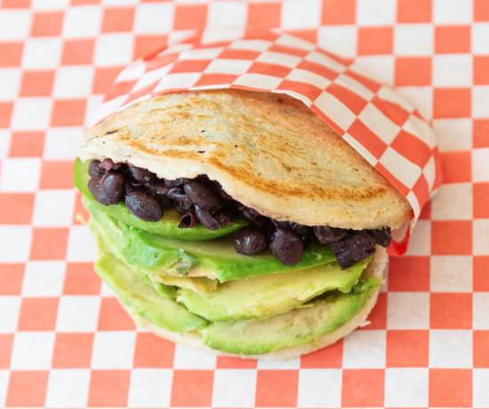 Order Black Beans & Avocado Arepa food online from La Latina store, Miami on bringmethat.com