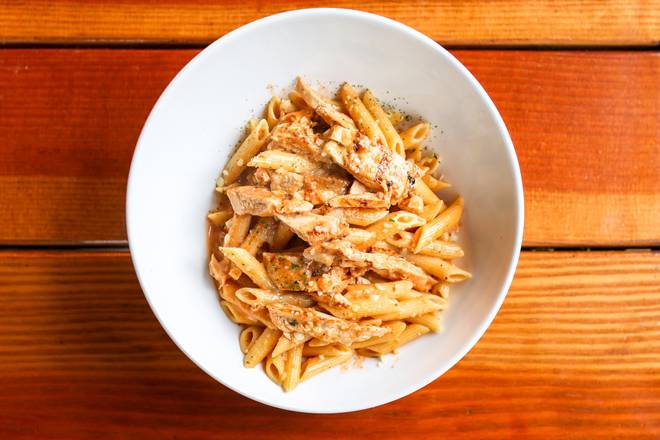 Order Penne Vodka with Chicken  food online from Tommy Tavern + Tap store, Parsippany on bringmethat.com