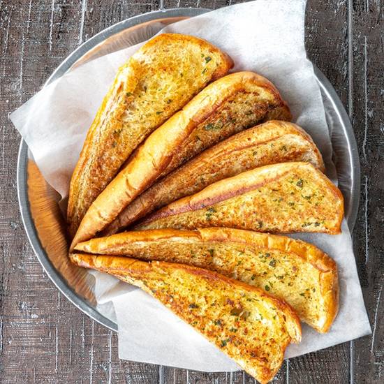 Order Garlic Bread (6 pieces) food online from Buffalos Cafe store, Dacula on bringmethat.com