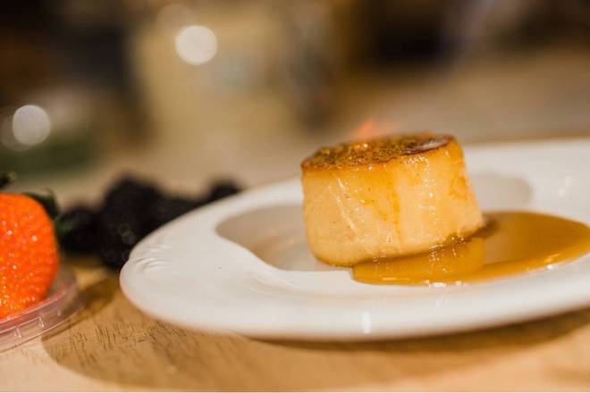 Order Brûléed Flan food online from Somos Vegetarians store, Denver on bringmethat.com