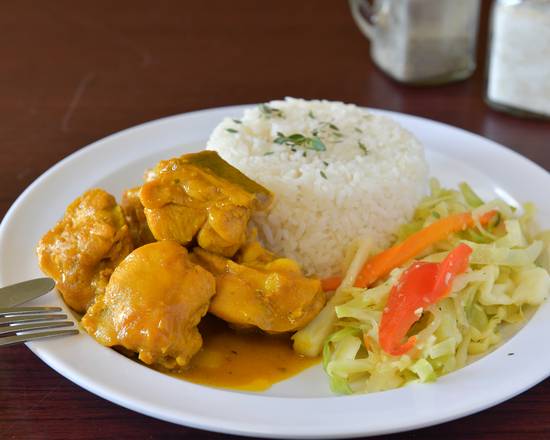Order Curry Chicken food online from Cravin Jamaican Cuisine store, Ossining on bringmethat.com