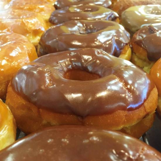 Order Chocolate Raised Donuts food online from Jannys store, Irvine on bringmethat.com