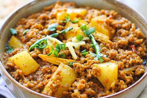 Order Qeema Alu food online from Hadi Restaurant store, New York on bringmethat.com
