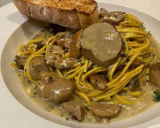 Order Black Truffle Tagliolini food online from Caffe Di Mauro store, Miami Beach on bringmethat.com