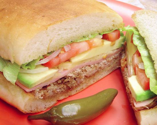 Order Torta de Lomo Special food online from Chihua Restaurant & Bar store, El Paso on bringmethat.com