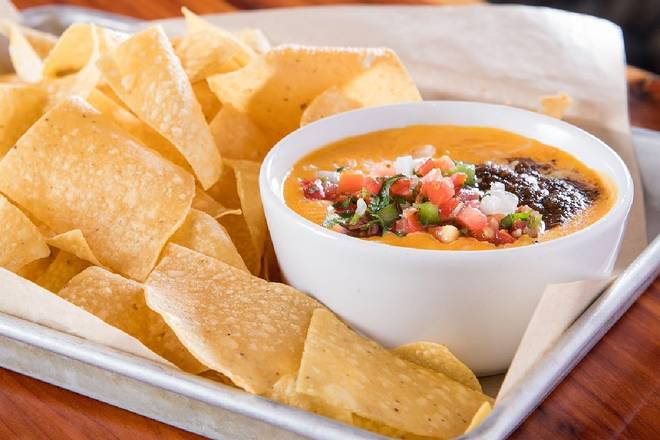 Order Chipotle Queso & Chips food online from Twin Peaks Restaurant store, Oakbrook Terrace on bringmethat.com