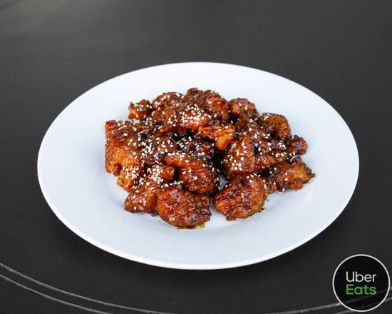 Order Orange Chicken, 26 oz food online from Famous Wok store, San Diego on bringmethat.com