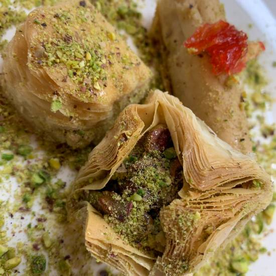 Order Lebanese Baklawa Sweets Mix  with Nuts and Pistachio Garnish food online from Mediterraneaneat All With Olive Oil store, Dallas on bringmethat.com
