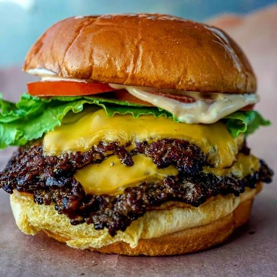 Order DOUBLE CHEESEBURGER food online from The Flaming Burger store, Huntington Beach on bringmethat.com