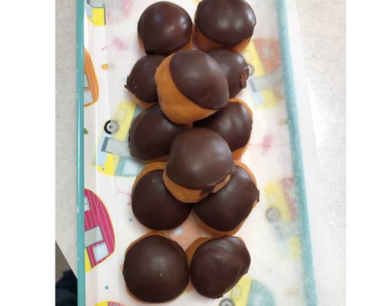 Order HOLES  - Dozen Chocolate Holes food online from Sonny Donuts store, Corinth on bringmethat.com