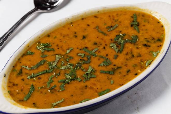Order Yellow Dal food online from Nirvana store, New Orleans on bringmethat.com