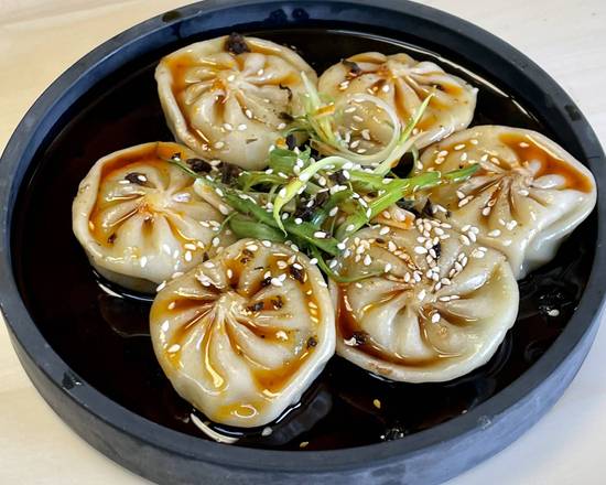 Order Mini Steam Buns 迷你汤包 food online from Johnny Carinos Italian Restaurant store, San Antonio on bringmethat.com