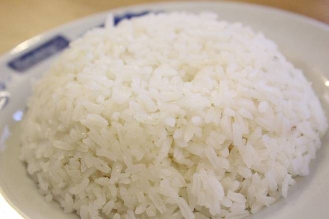Order Arroz food online from Mondongo's Restaurant store, Doral on bringmethat.com