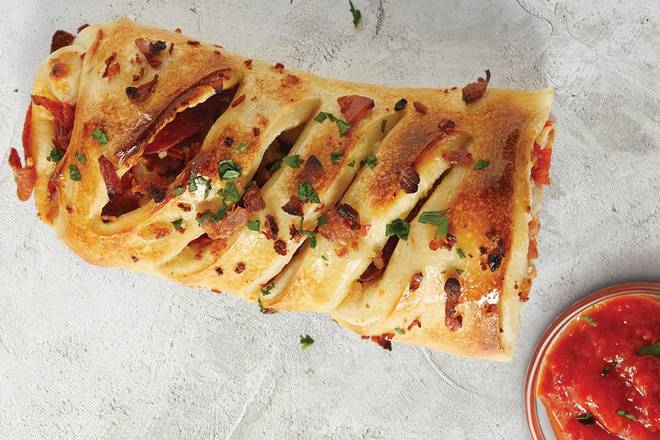 Order Individual Pepperoni, Sausage and Bacon Stromboli food online from Sbarro store, West Nyack on bringmethat.com