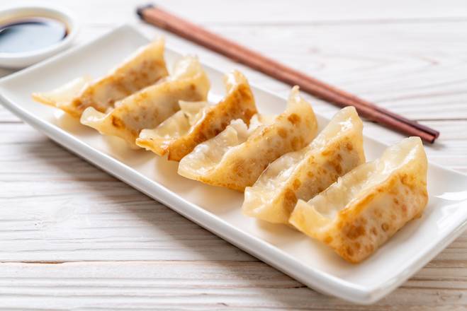 Order Pan Fried Gyoza Dumplings 煎鸡肉饺子 food online from Kazan Ramen & Gyoza store, New York on bringmethat.com