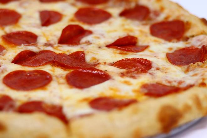 Order Pepperoni Pizza food online from King's Pizza store, Daytona Beach on bringmethat.com