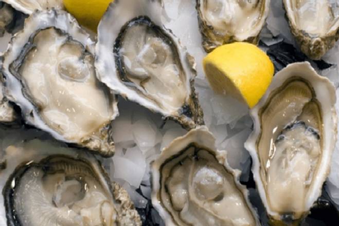 Order Oysters Canada Dozen food online from Parc Oasis store, New York on bringmethat.com